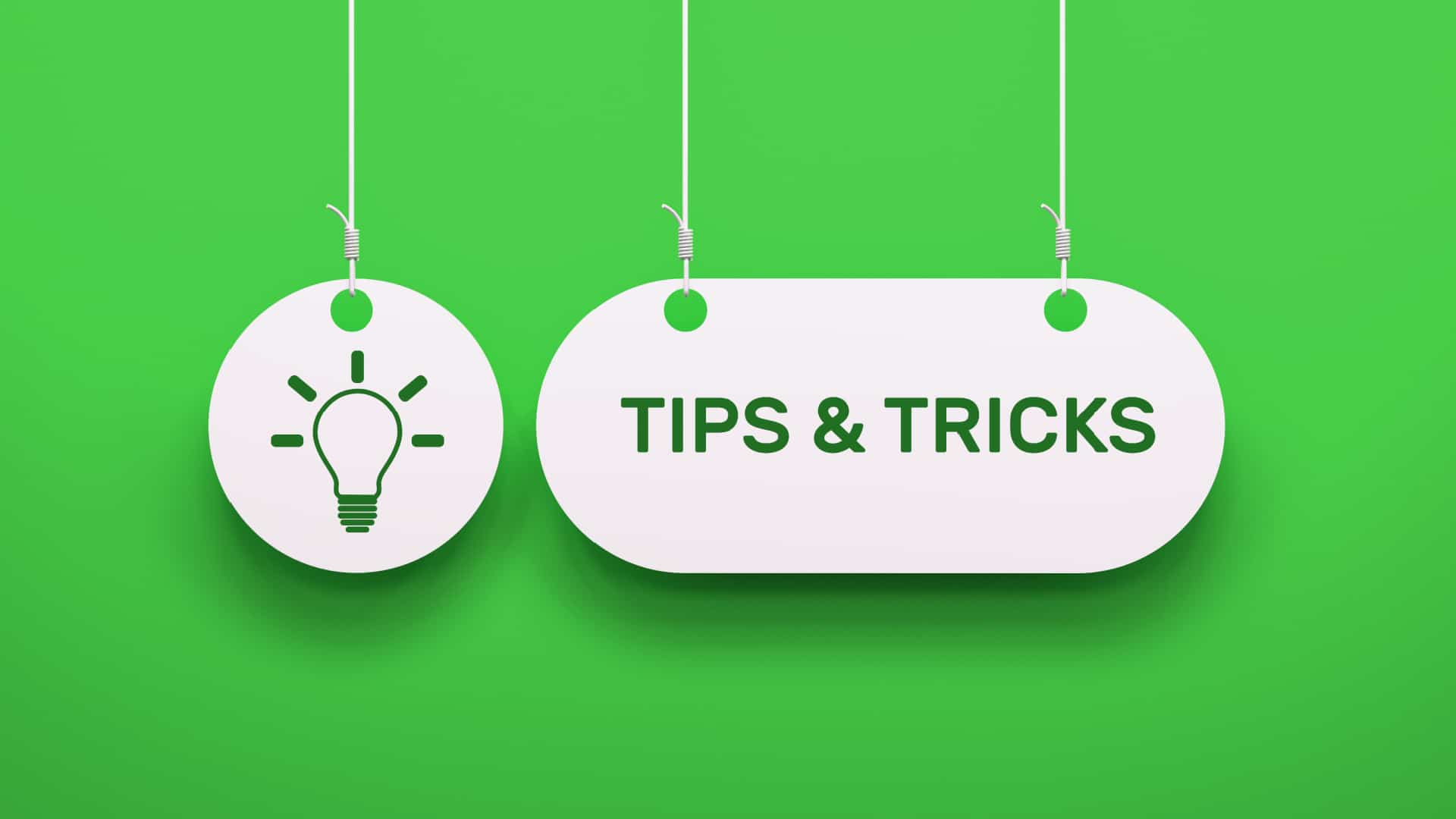 Tag with an idea lightbulb and tag saying “tips and tricks” in front of a green background.