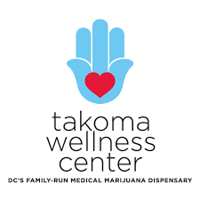 Takoma Wellness Center’s logo is a blue hamsa with a red heart in the palm.