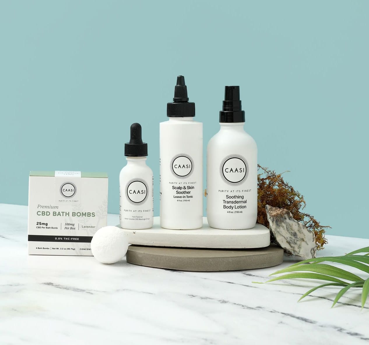 CAASI CBD products including CBD Bath Bombs, Water-Soluble Drops, Scalp & Skin Soother, and Soothing Transdermal Body Lotion.