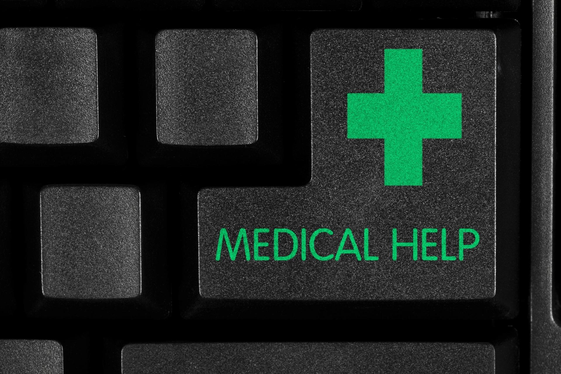 Keyboard key labeled “medical help” with green cross indicating medical marijuana/cannabis/hemp guidance.